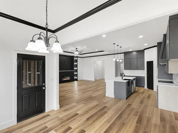 an aerial view of a house with yard