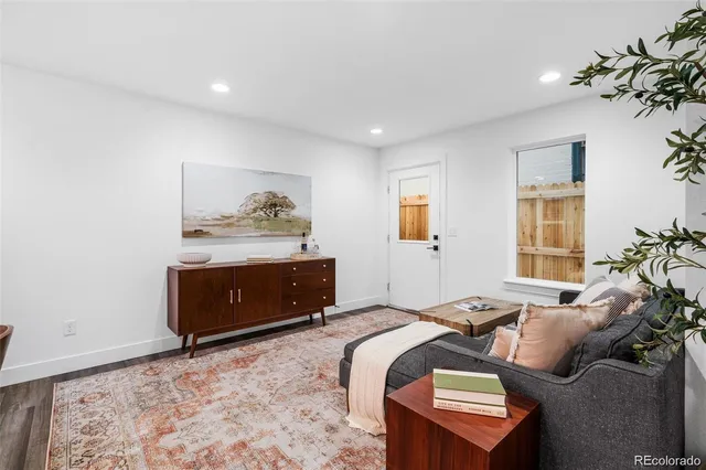 a bed room with a bed and a dresser