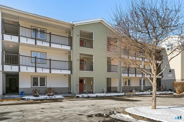 a front view of a building with street