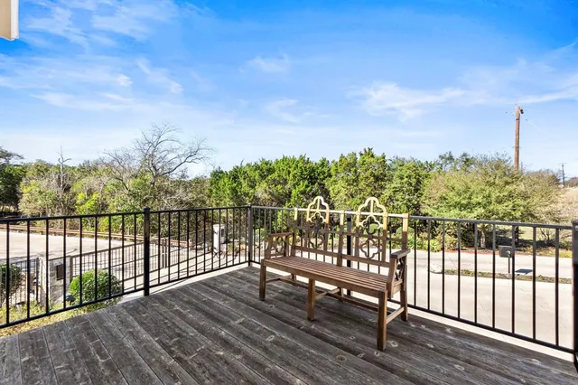 a kitchen with sink cabinets and wooden floor