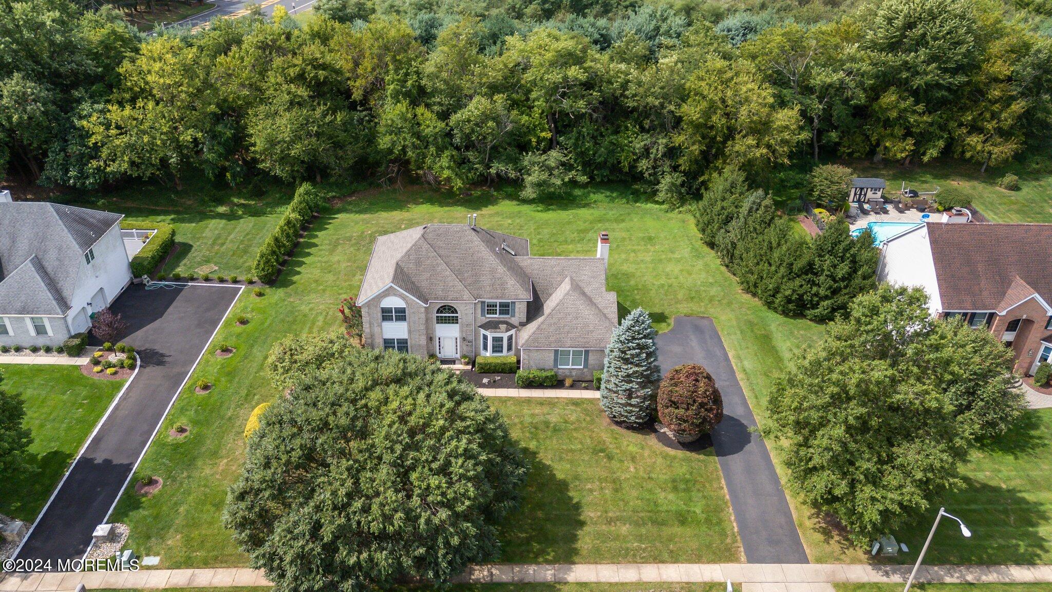 111 Bennington Road Freehold, NJ 07728 - Photo 3 of 70 65-web-or-mls-DJI_20240829114900_0209_D