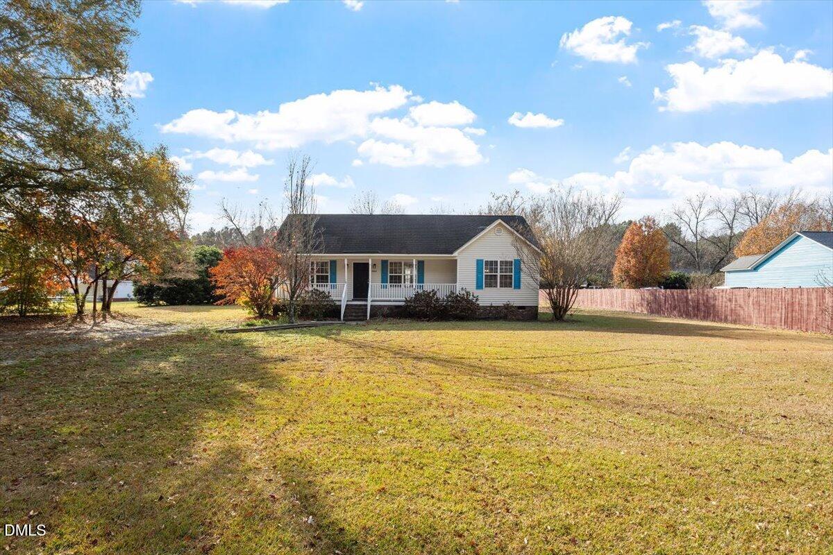 1084 McLemore Road Clayton, NC 27520 - Photo 3 of 34 a front view of house with ocean view