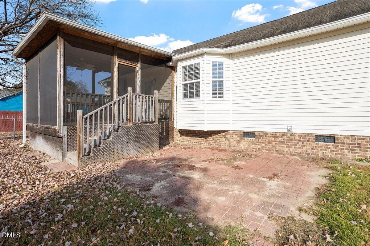 1084 McLemore Road Clayton, NC 27520 - Photo 32 of 34 a front view of a house with a porch