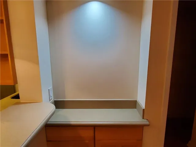 a room with a bed and a window