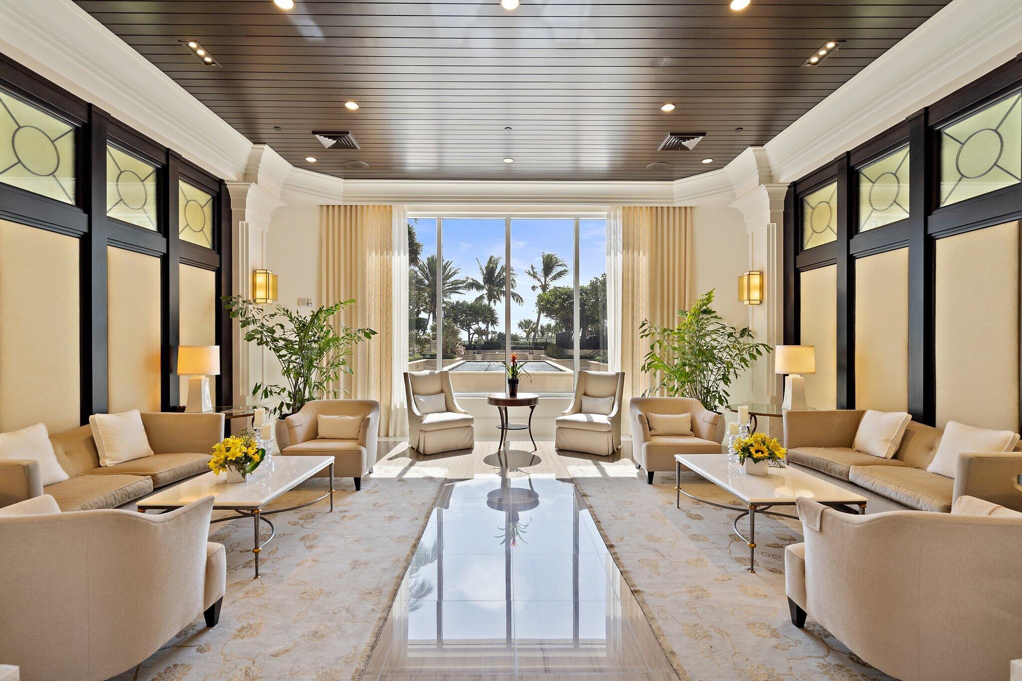 2700 North Ocean Drive, Unit 304B Singer Island, FL 33404 - Photo 32 of 91 a living room with furniture and a large window