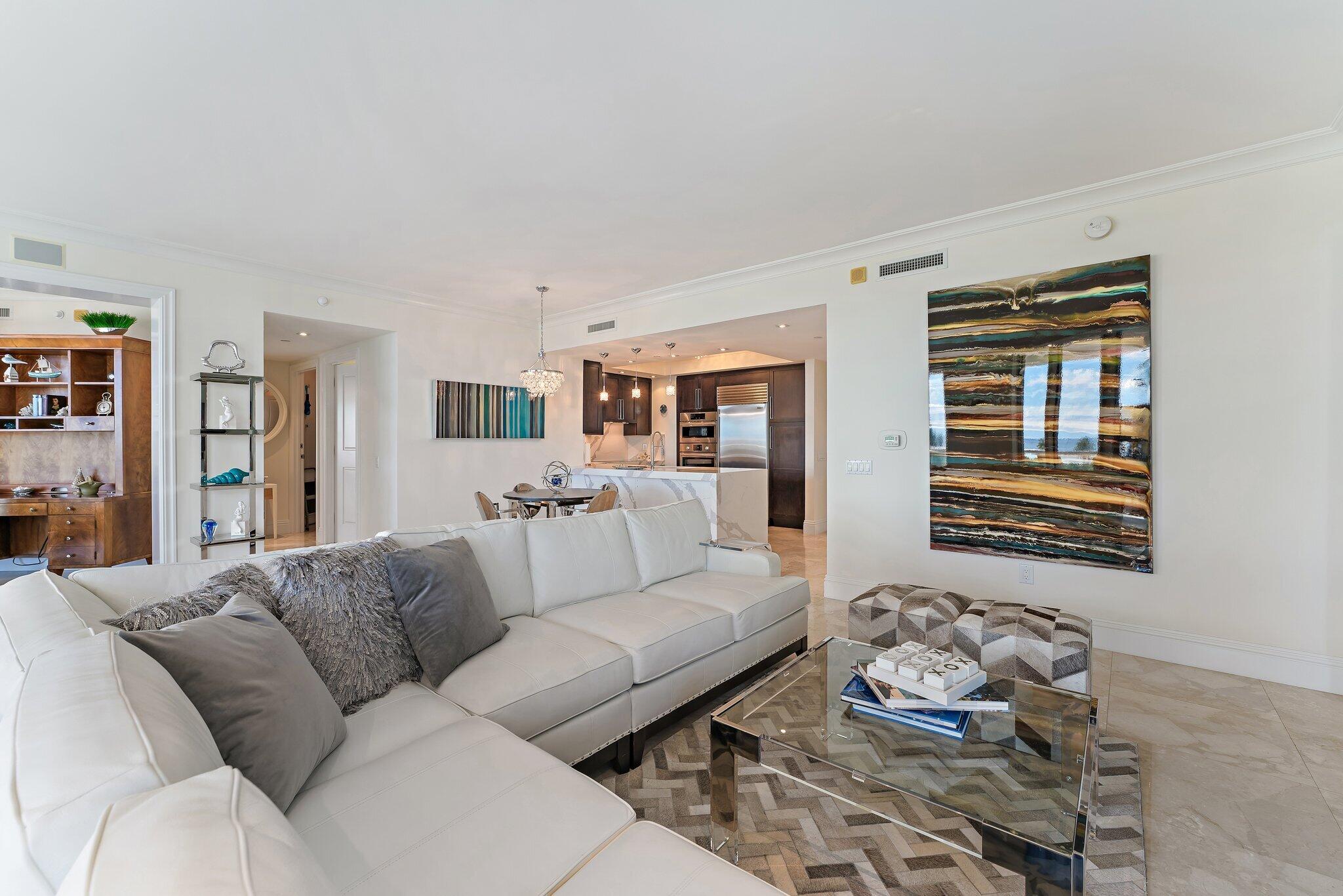 2700 North Ocean Drive, Unit 304B Singer Island, FL 33404 - Photo 63 of 91 a living room with furniture and a window