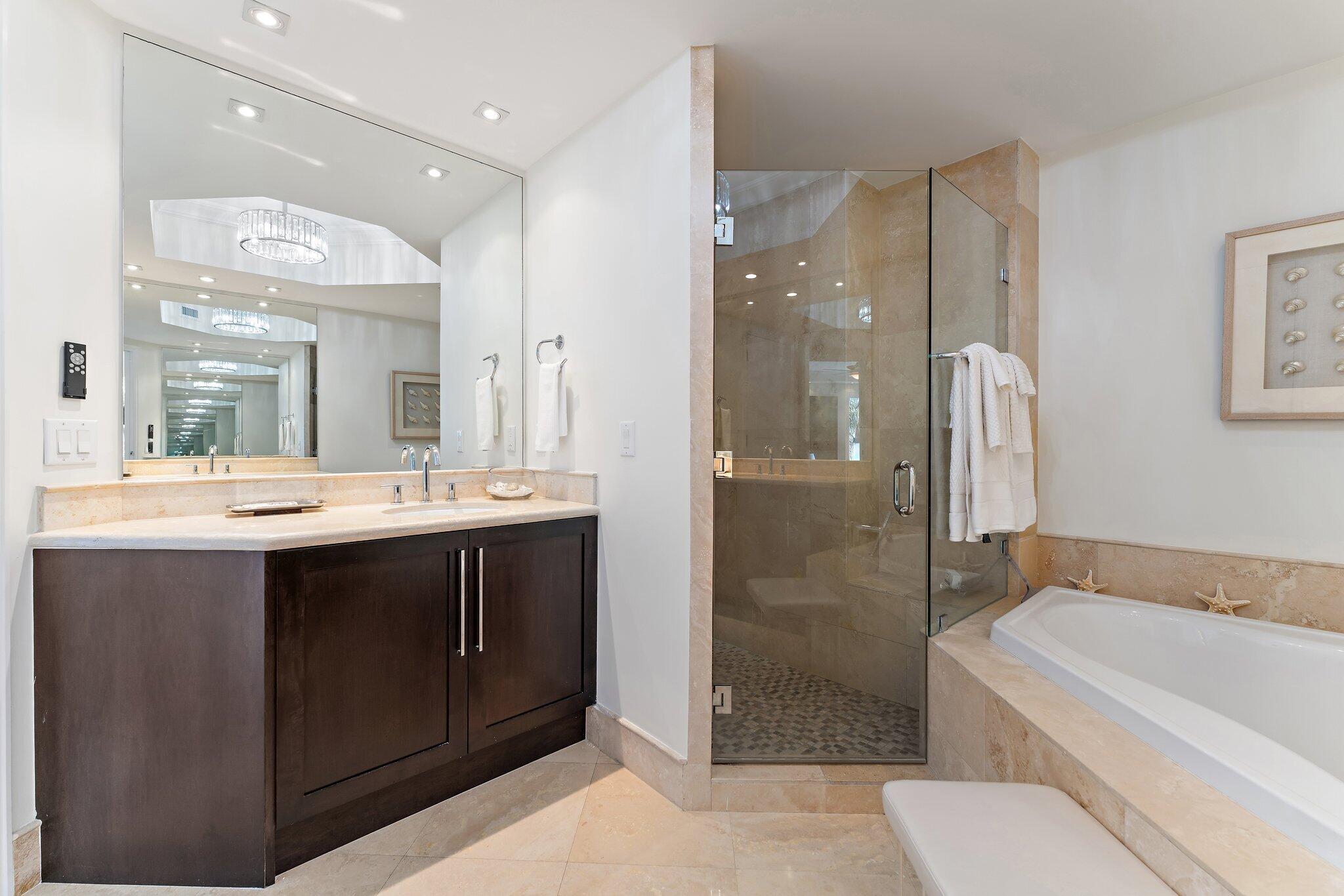 2700 North Ocean Drive, Unit 304B Singer Island, FL 33404 - Photo 81 of 91 a bathroom with a sink a toilet and shower