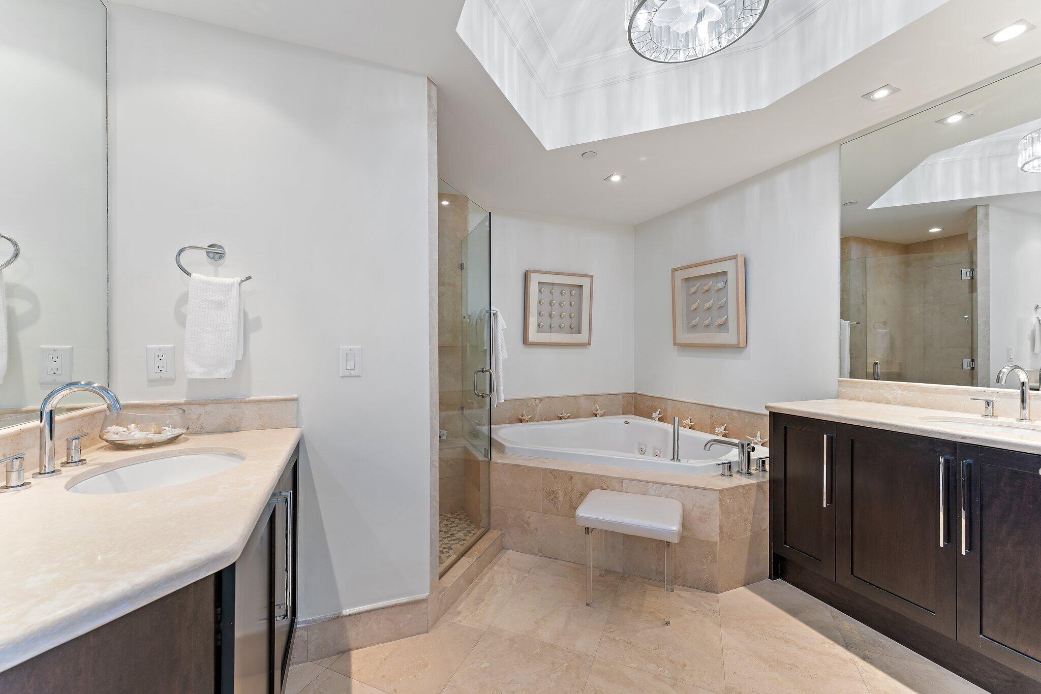 2700 North Ocean Drive, Unit 304B Singer Island, FL 33404 - Photo 83 of 91 a bathroom with a sink a toilet and bathtub