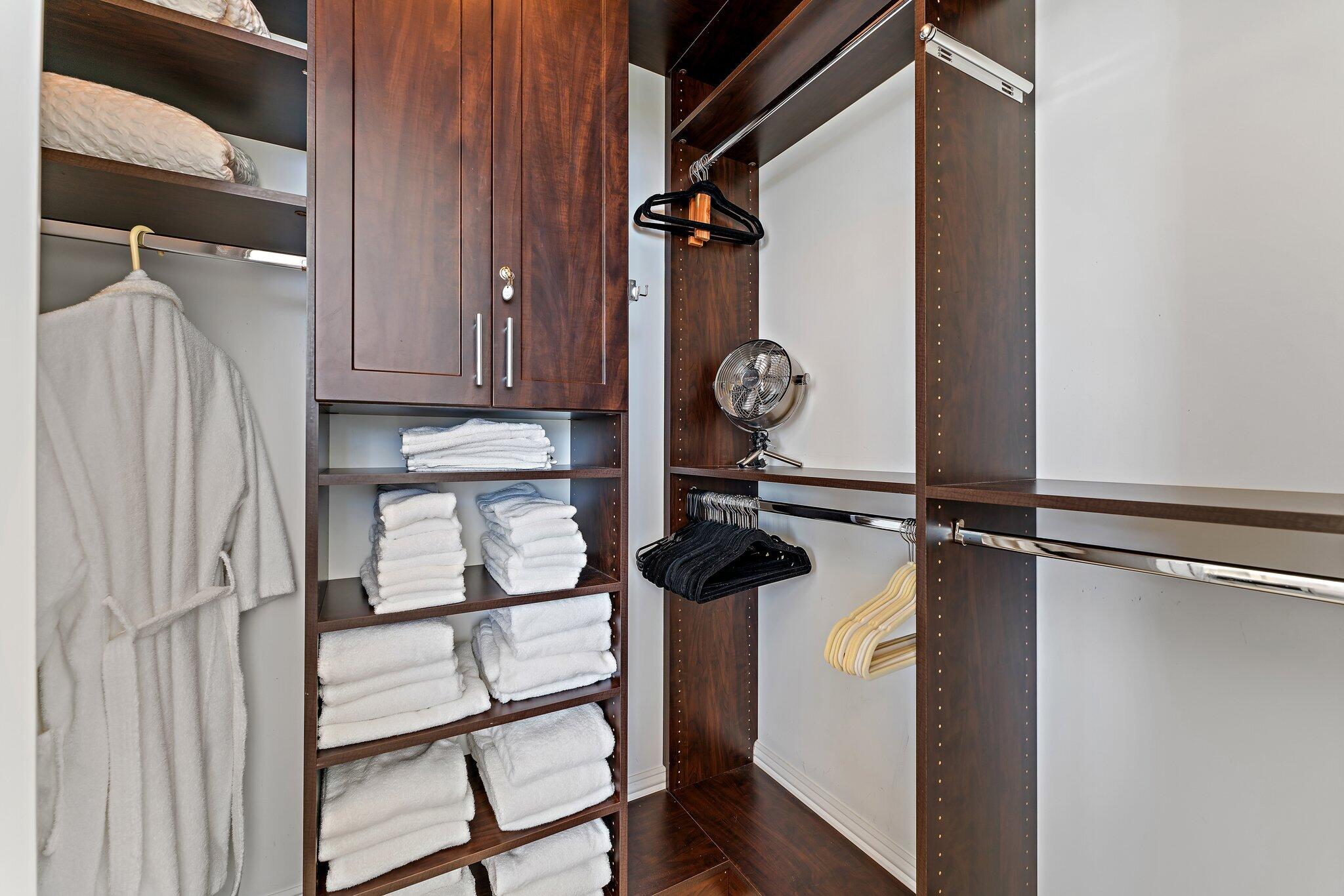 2700 North Ocean Drive, Unit 304B Singer Island, FL 33404 - Photo 90 of 91 a view of walk in closet with clothes and shoes