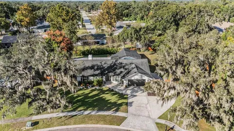 an aerial view of residential house with parking space