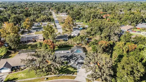 an aerial view of residential house with parking space