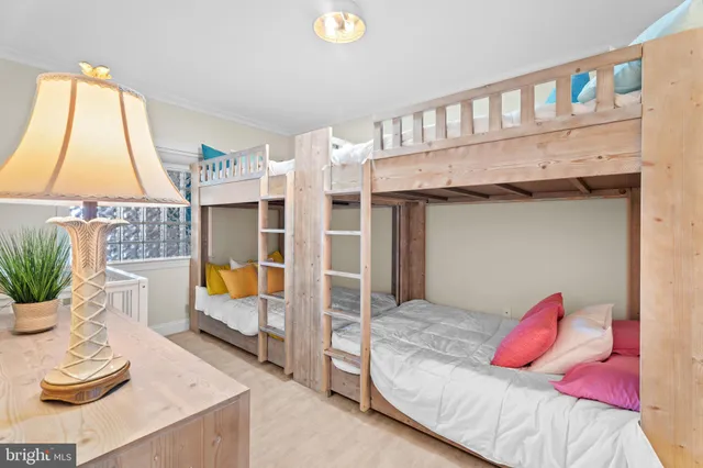 a bedroom with furniture and a bed