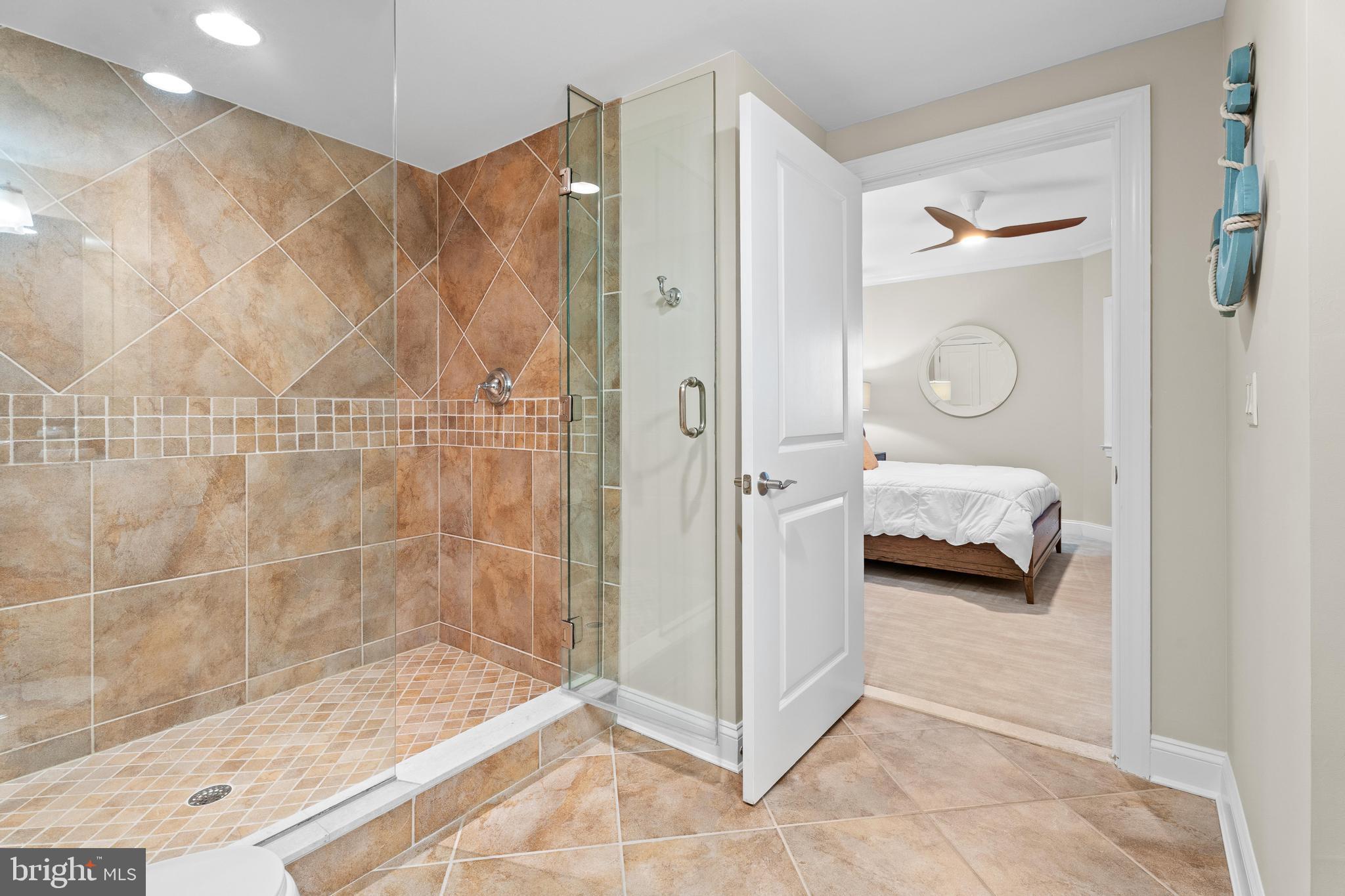 6 60th Street, Unit 102 Ocean City, MD 21842 - Photo 42 of 58 a en suite bathroom with a shower