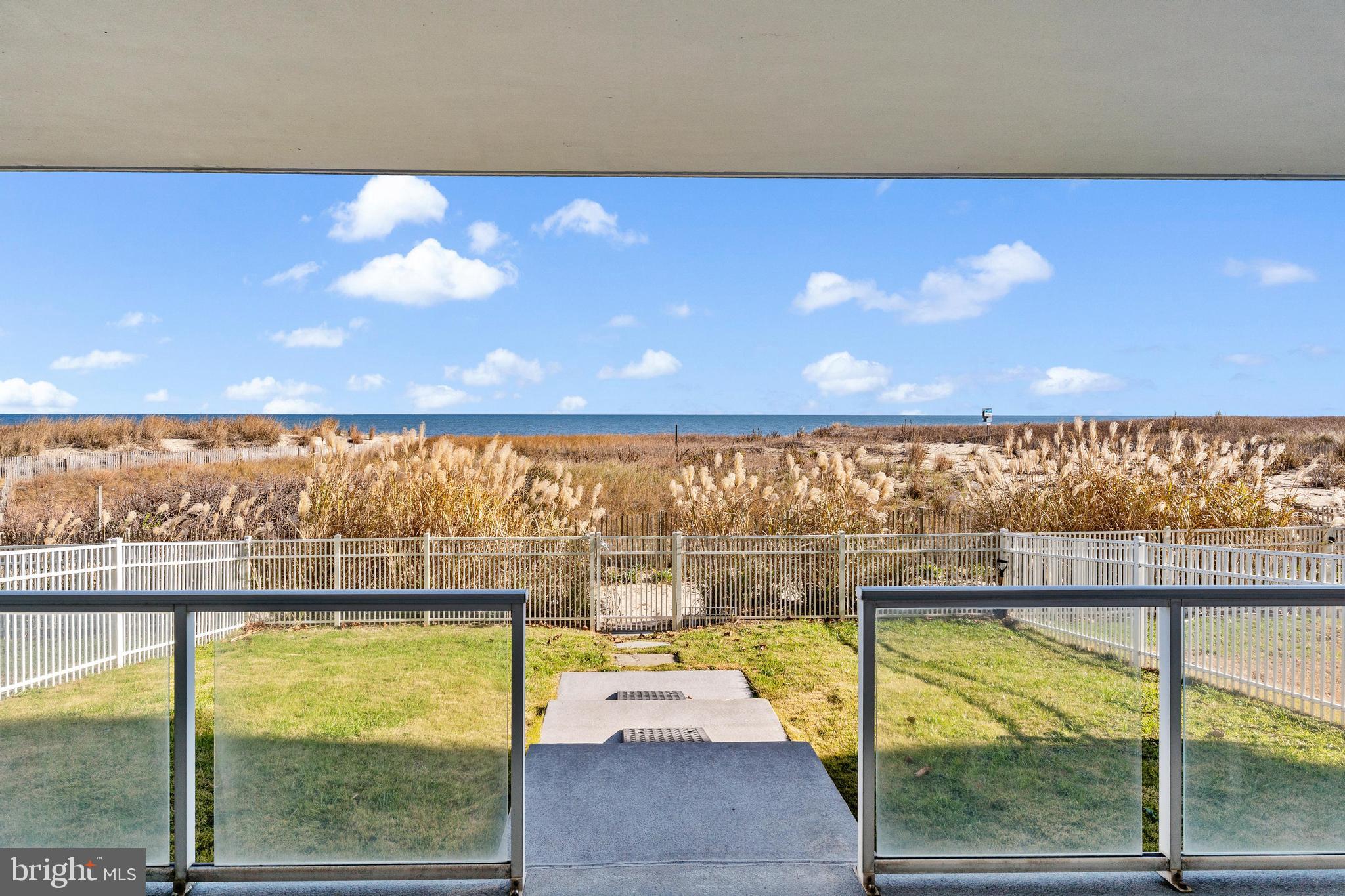 6 60th Street, Unit 102 Ocean City, MD 21842 - Photo 46 of 58 a view of swimming pool with an outdoor seating