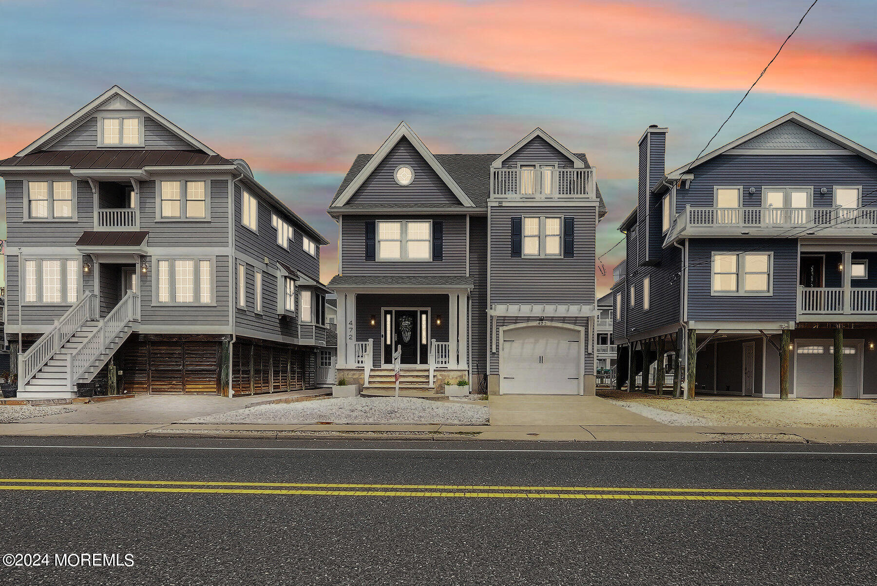 472 Brielle Road Manasquan, NJ 08736 - Photo 1 of 52 a view of a big house with a large windows