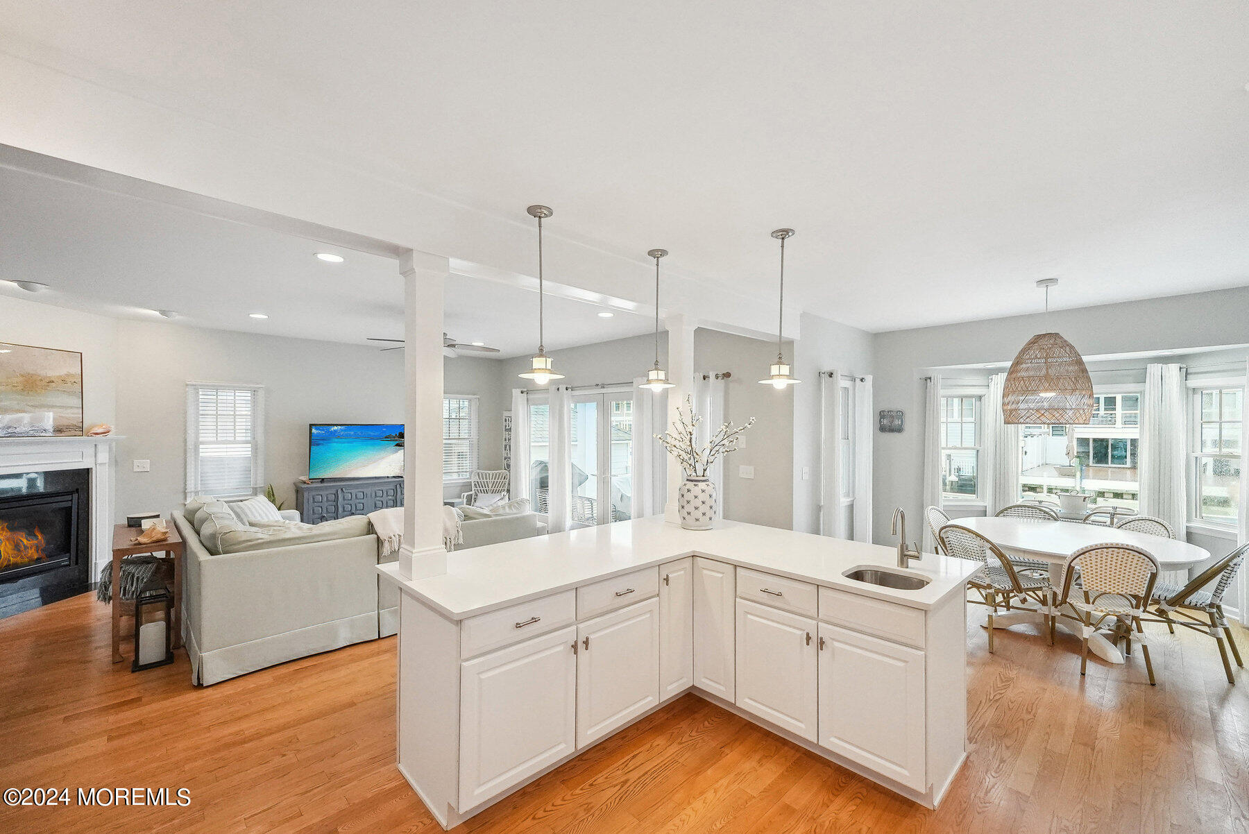 472 Brielle Road Manasquan, NJ 08736 - Photo 11 of 52 a large white open kitchen with a large window and kitchen view