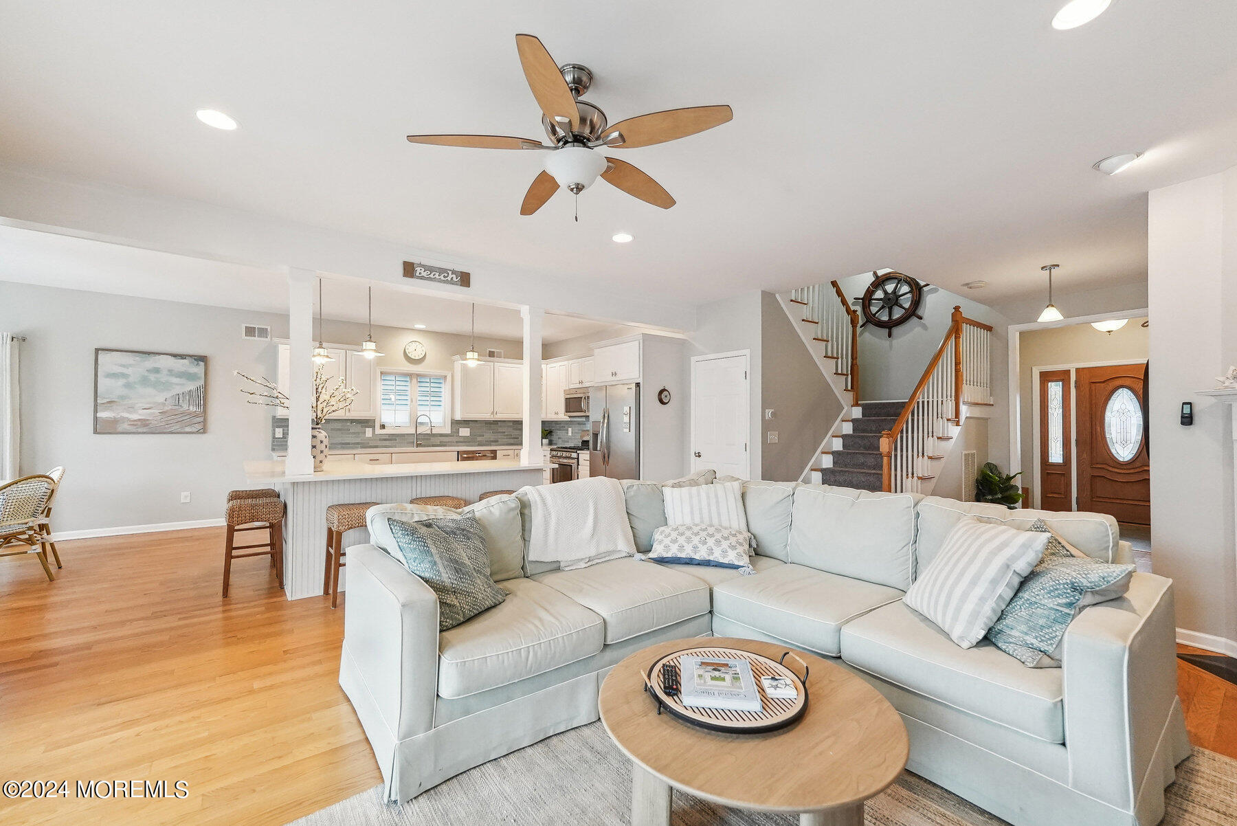 472 Brielle Road Manasquan, NJ 08736 - Photo 12 of 52 a living room with furniture and a view of kitchen