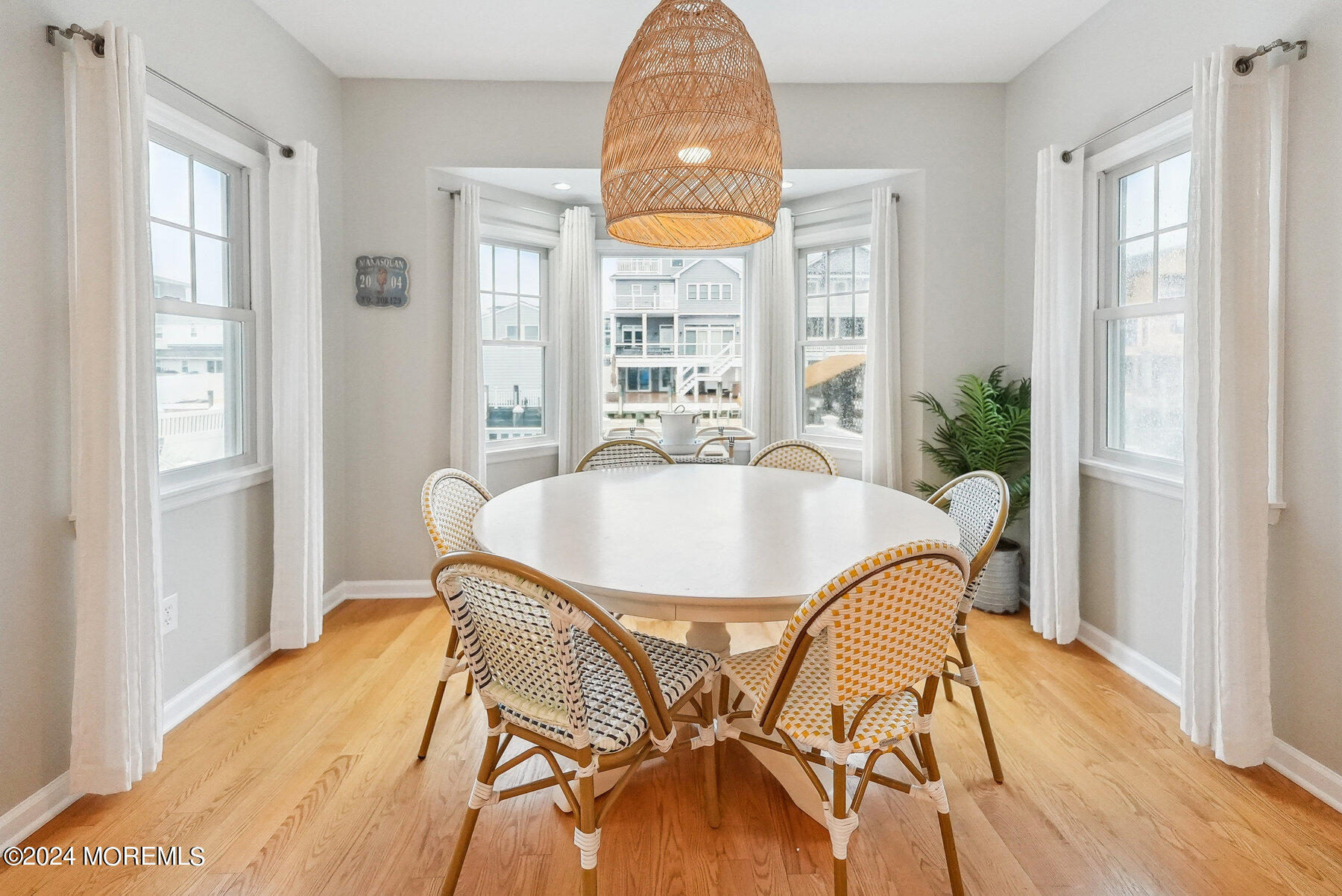 472 Brielle Road Manasquan, NJ 08736 - Photo 14 of 52 a dining room with furniture window wooden floor