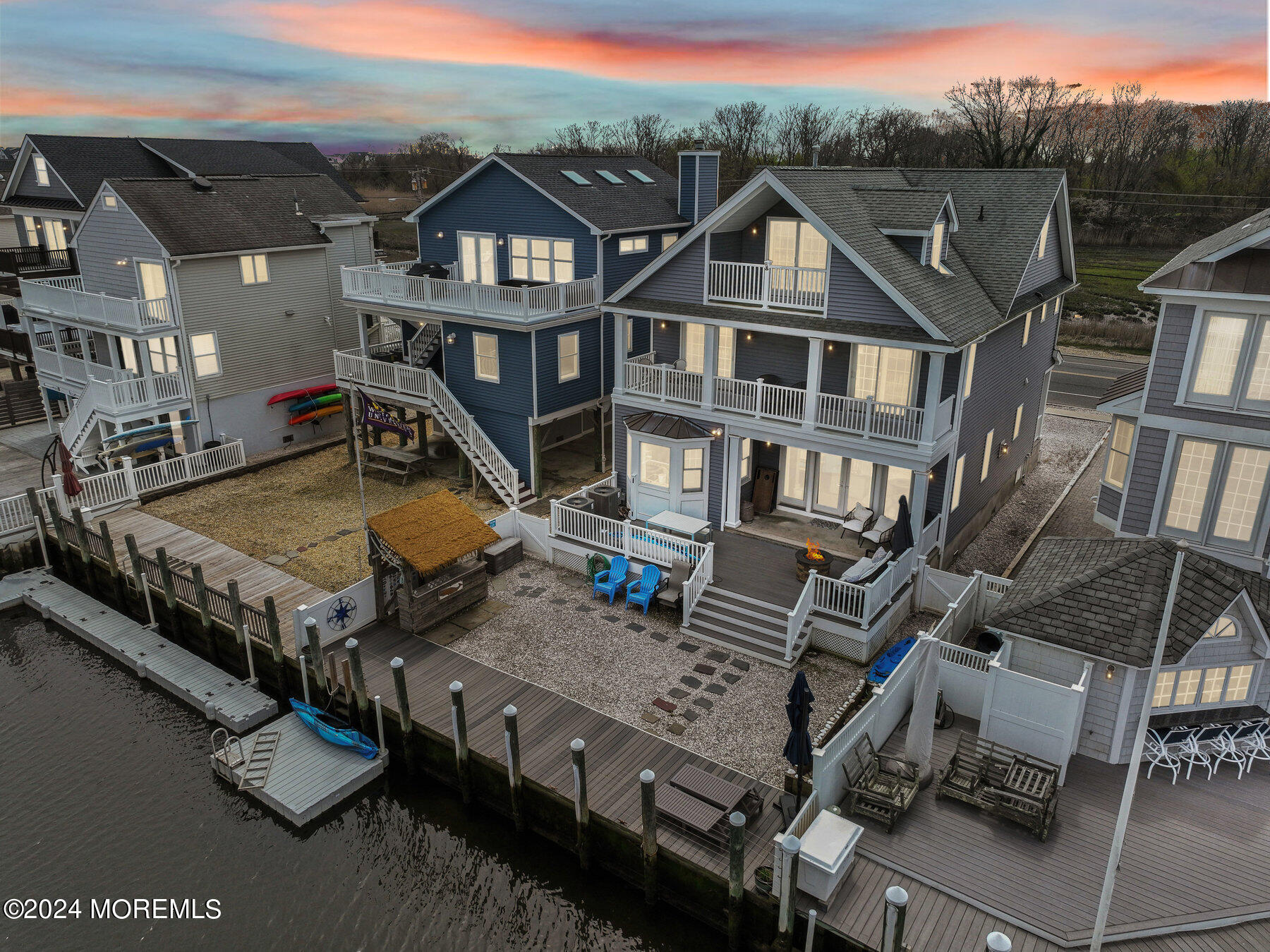 472 Brielle Road Manasquan, NJ 08736 - Photo 2 of 52 a aerial view of a house with a swimming pool