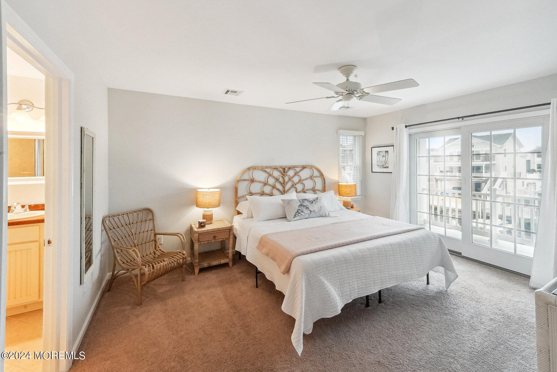472 Brielle Road Manasquan, NJ 08736 - Photo 22 of 52 a bedroom with a bed a table and chair