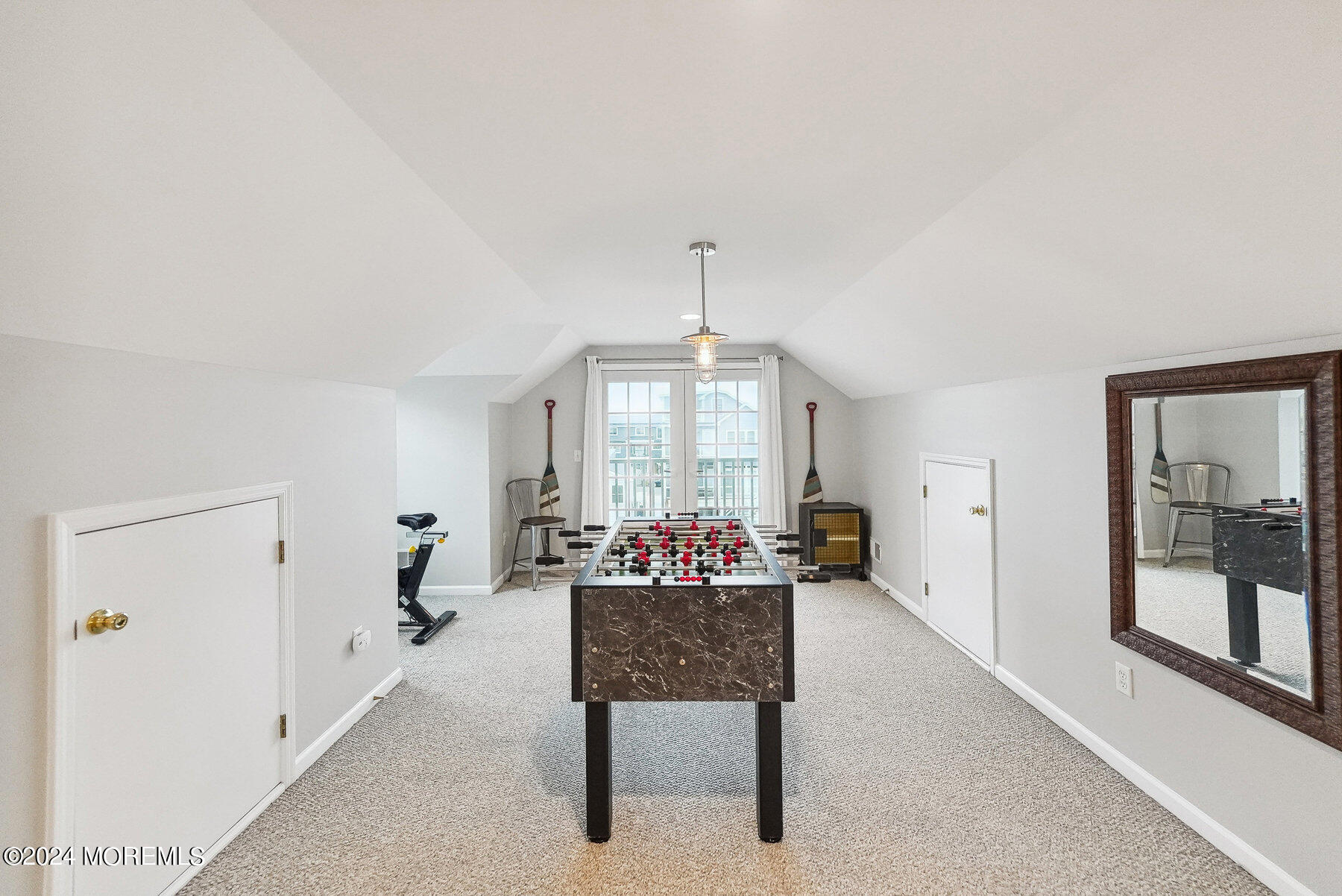 472 Brielle Road Manasquan, NJ 08736 - Photo 32 of 52 a living room with furniture and a chandelier