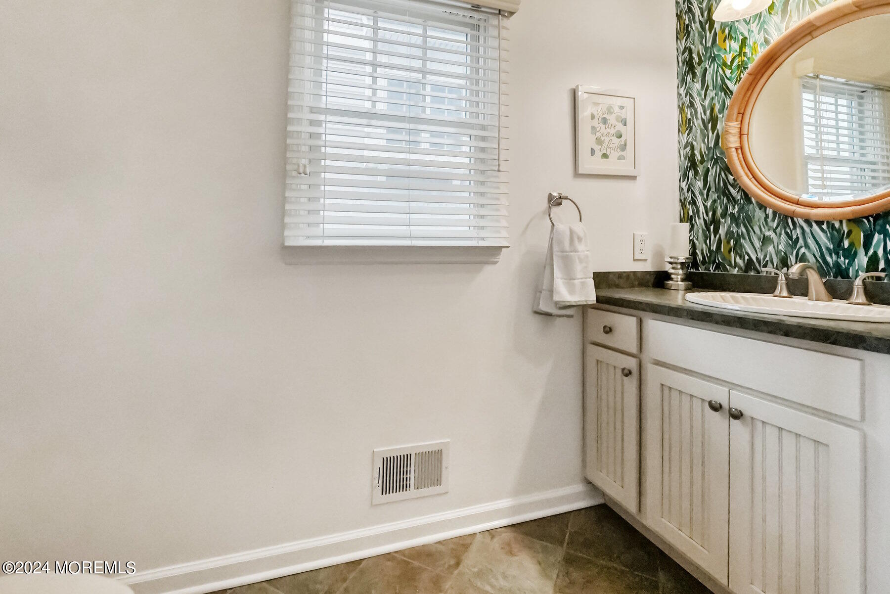 472 Brielle Road Manasquan, NJ 08736 - Photo 34 of 52 a bathroom with a sink and a mirror