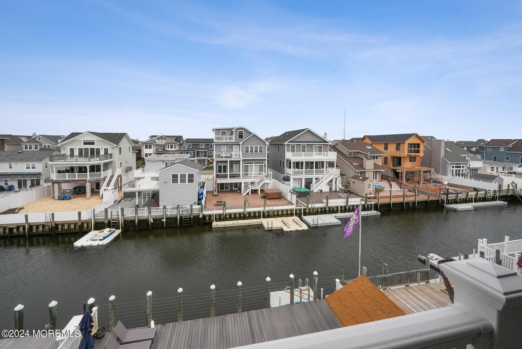 472 Brielle Road Manasquan, NJ 08736 - Photo 36 of 52 an aerial view of a house with a lake view