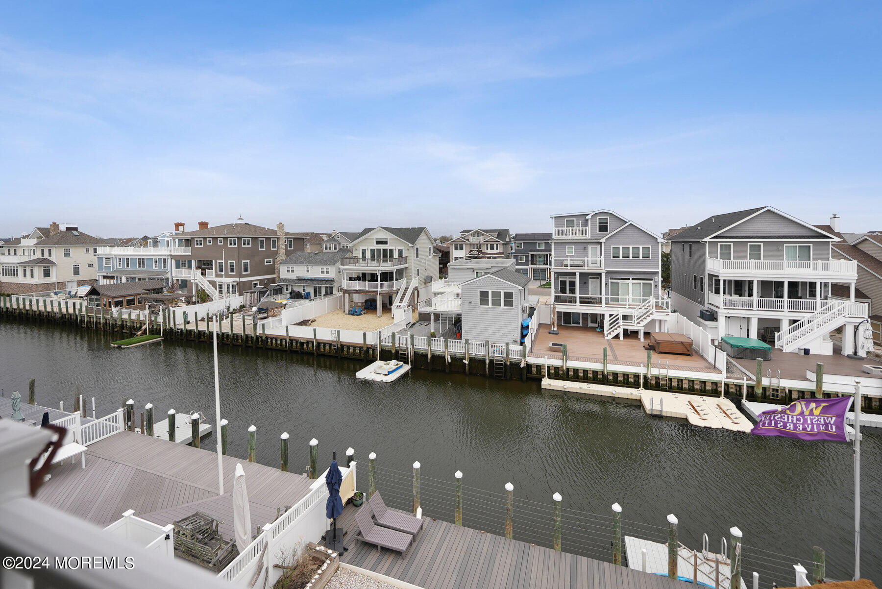 472 Brielle Road Manasquan, NJ 08736 - Photo 37 of 52 a view of a lake with a city skyline in the background