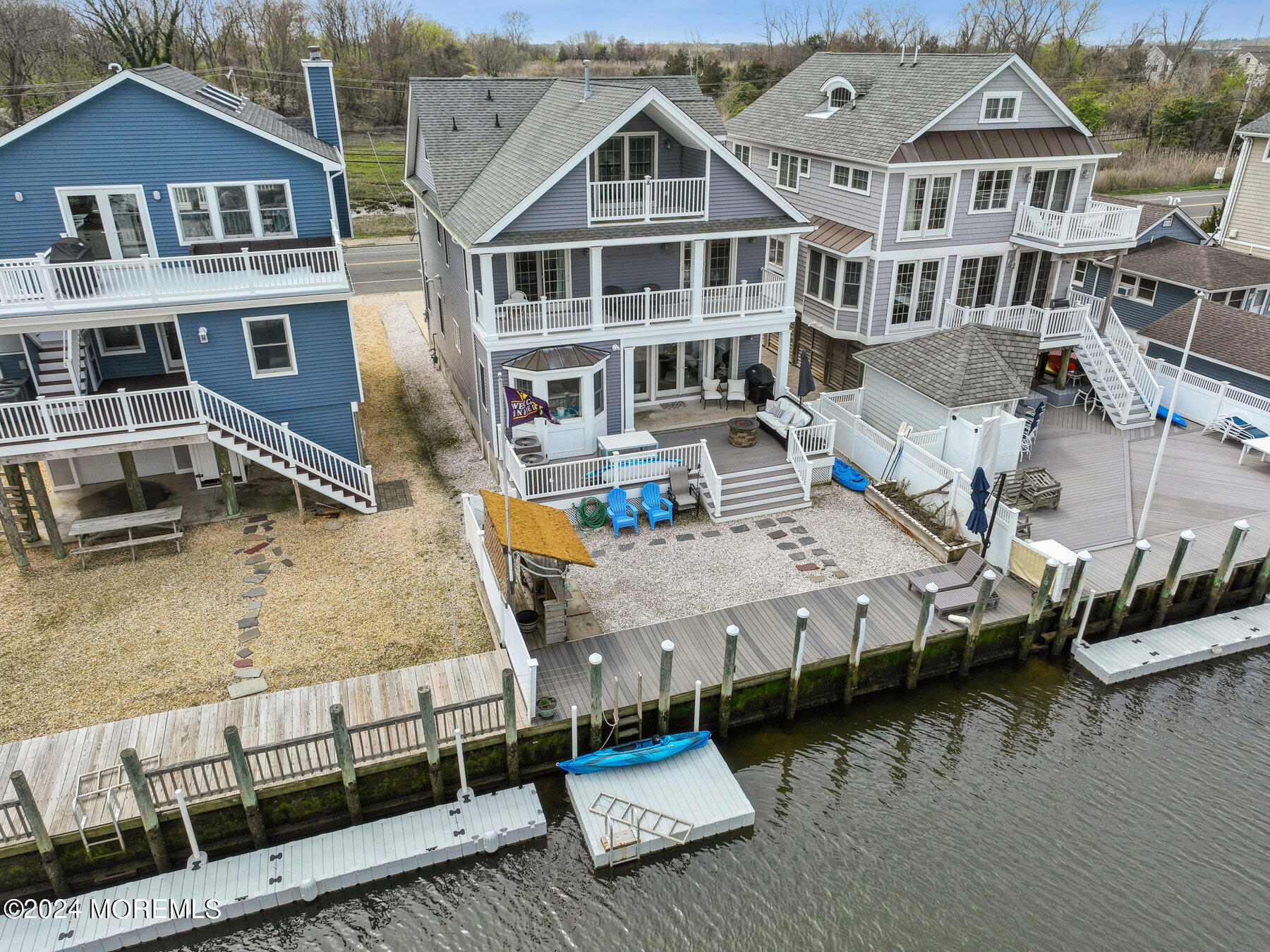 472 Brielle Road Manasquan, NJ 08736 - Photo 47 of 52 a aerial view of a brick building next to a road