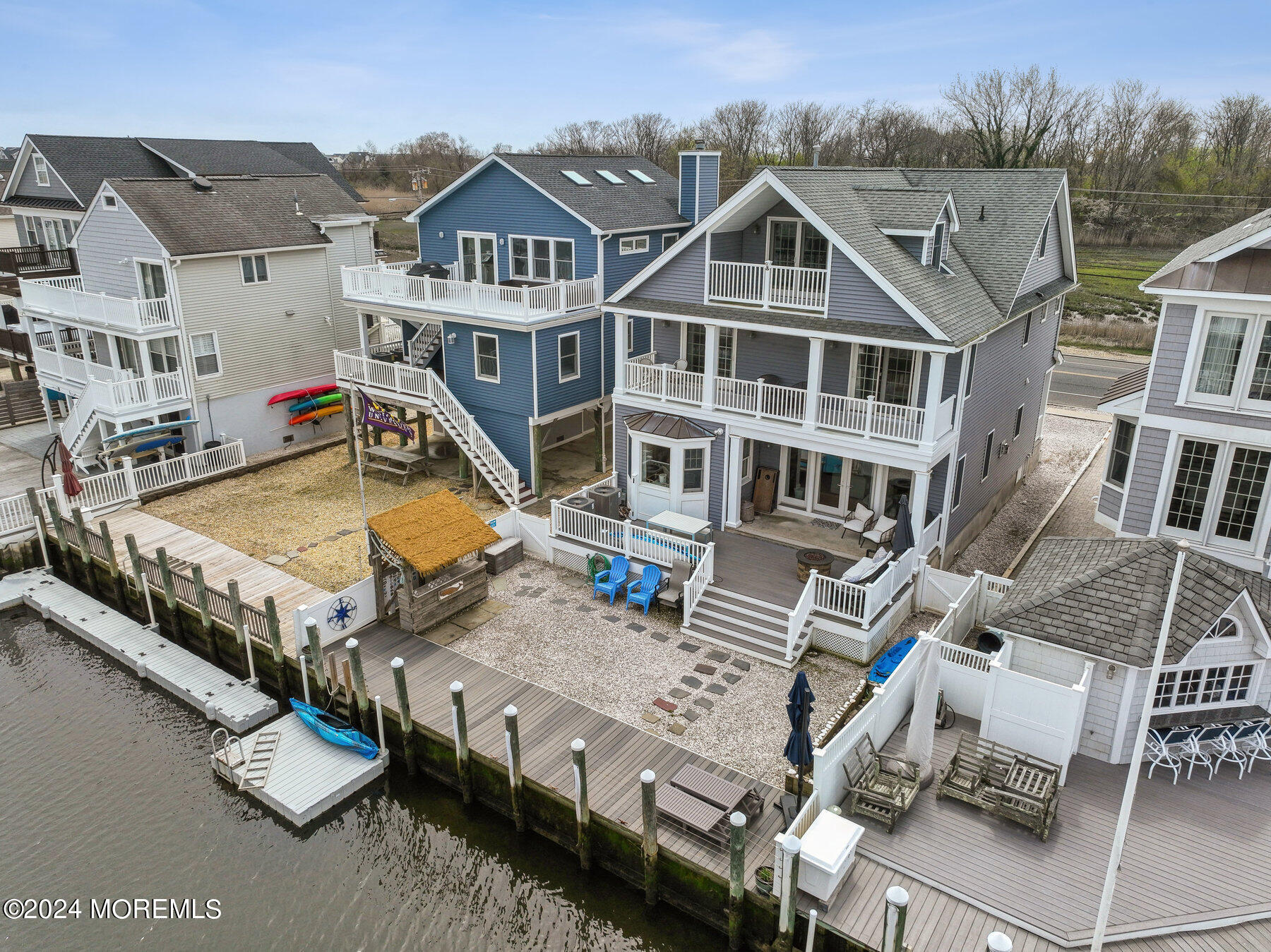 472 Brielle Road Manasquan, NJ 08736 - Photo 48 of 52 an aerial view of a house with a swimming pool