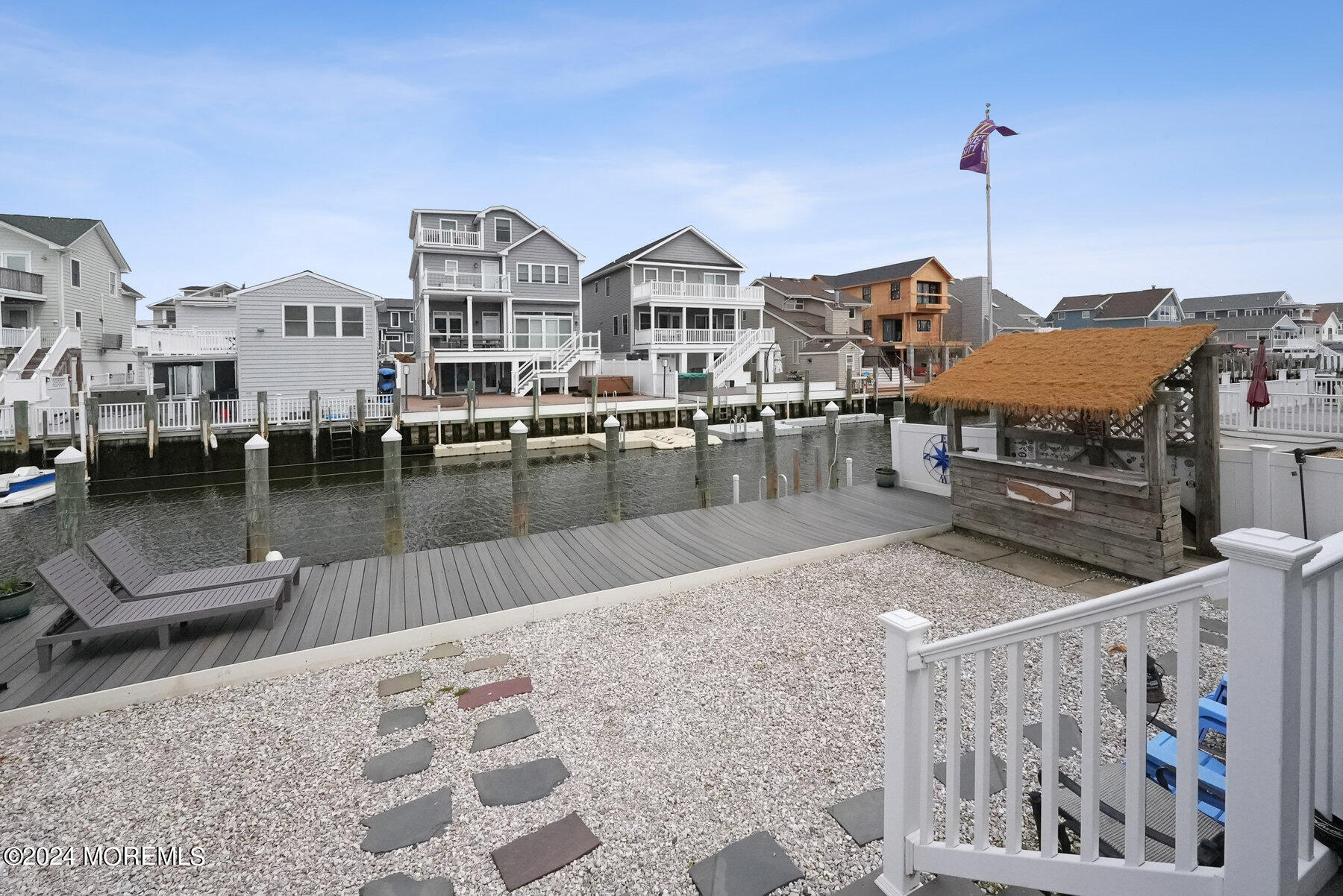 472 Brielle Road Manasquan, NJ 08736 - Photo 8 of 52 a outdoor space with lots of white furniture