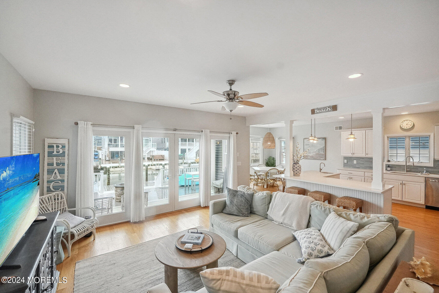 472 Brielle Road Manasquan, NJ 08736 - Photo 9 of 52 a living room with furniture and a large window