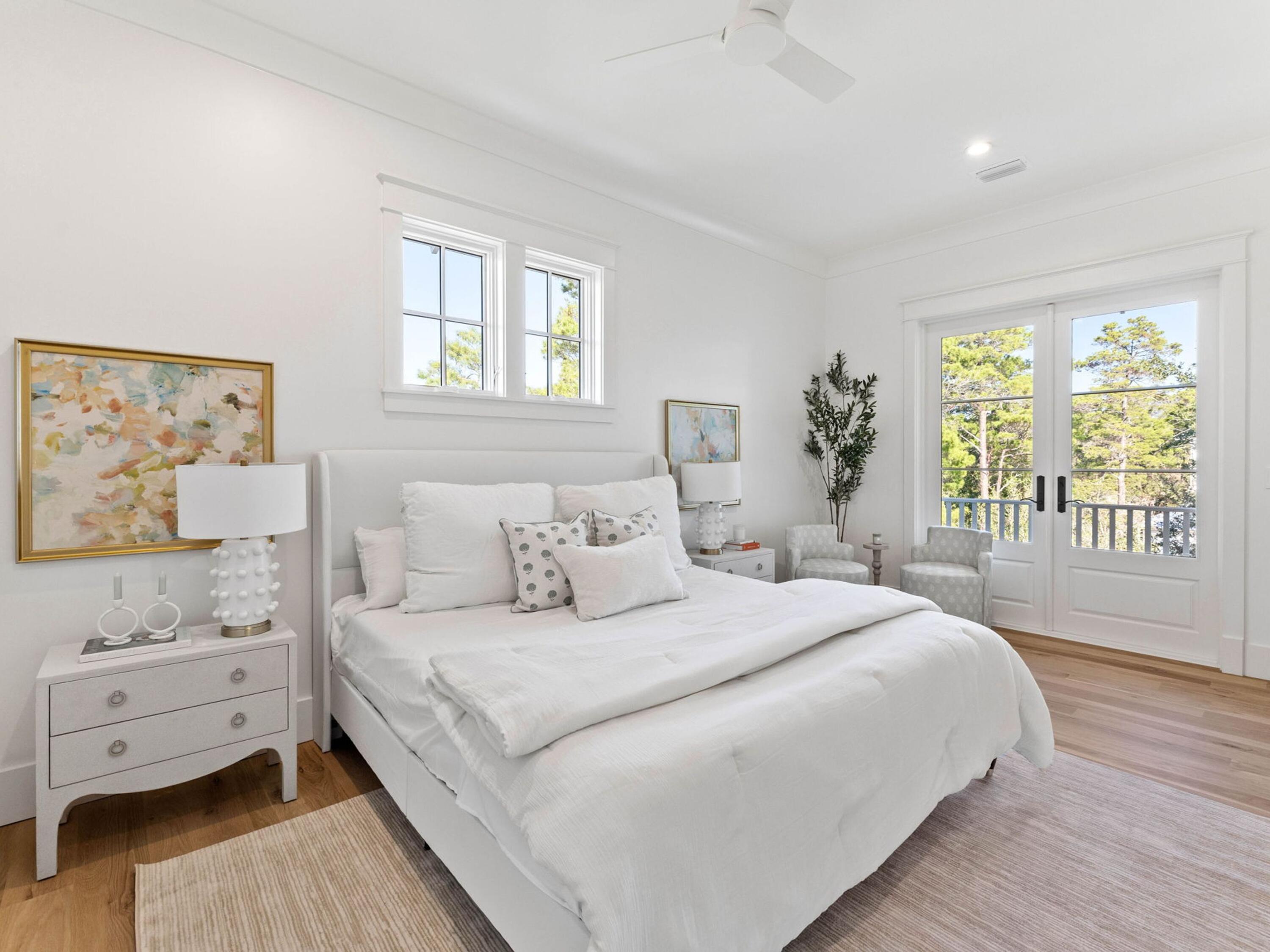 79 Dune Ridge Road Santa Rosa Beach, FL 32459 - Photo 33 of 50 a bedroom with a bed and a large window