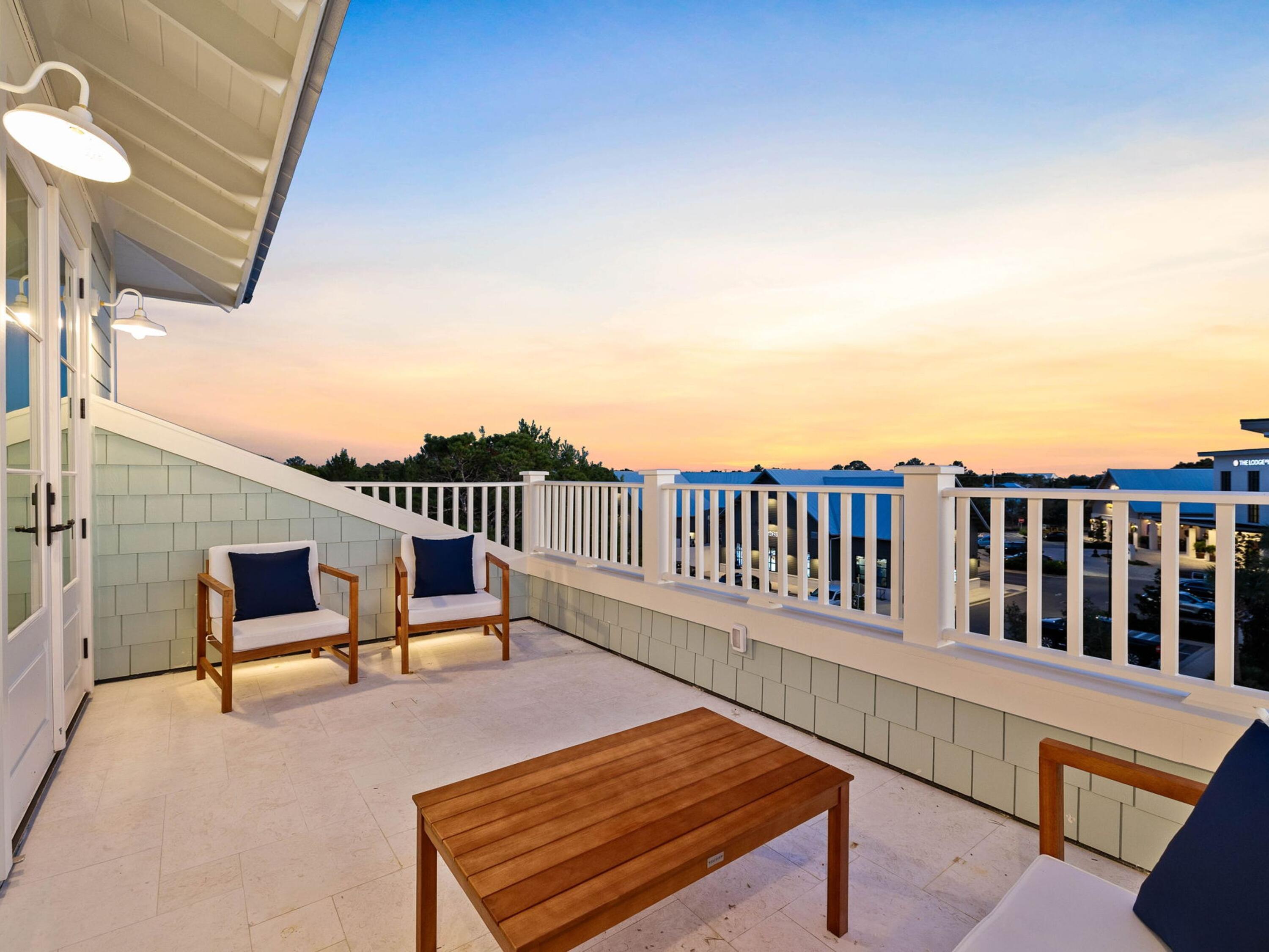 79 Dune Ridge Road Santa Rosa Beach, FL 32459 - Photo 44 of 50 a roof deck with a fence
