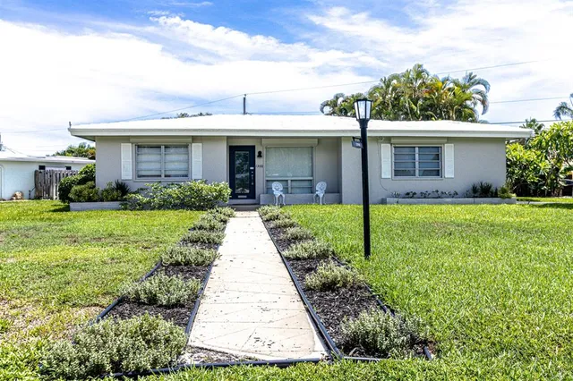 a front view of house with yard