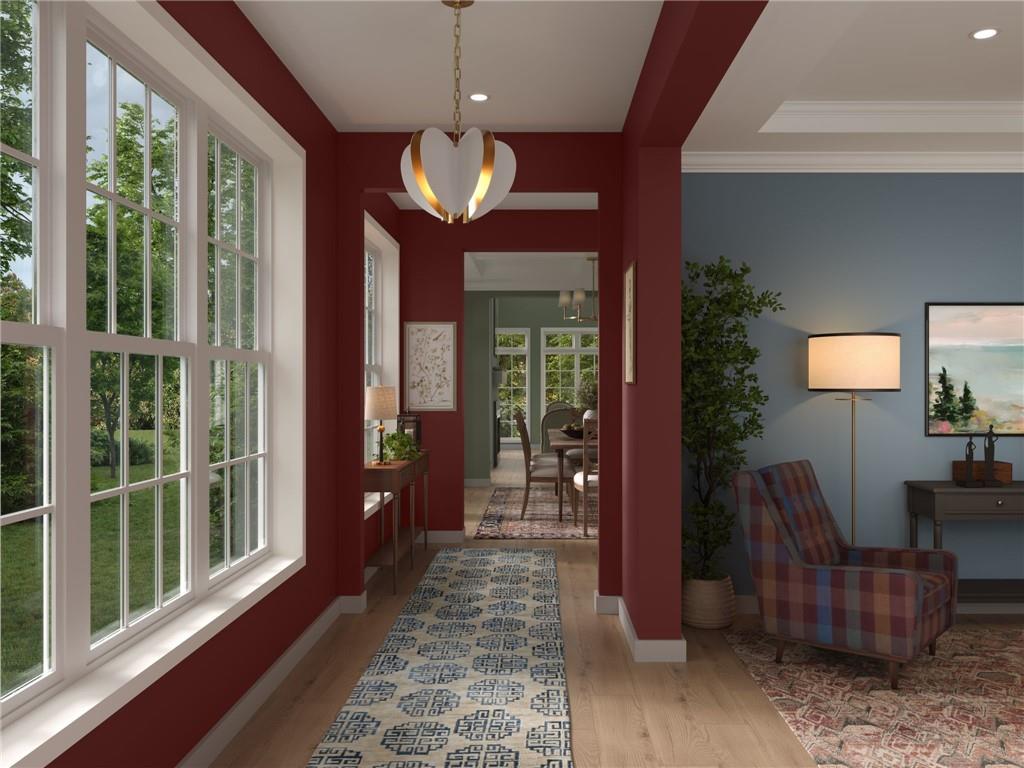 102 Ramsgate Road, Unit ORKNEY Cranberry Township, PA 16066 - Photo 13 of 40 a view of a livingroom with furniture wooden floor and chandelier