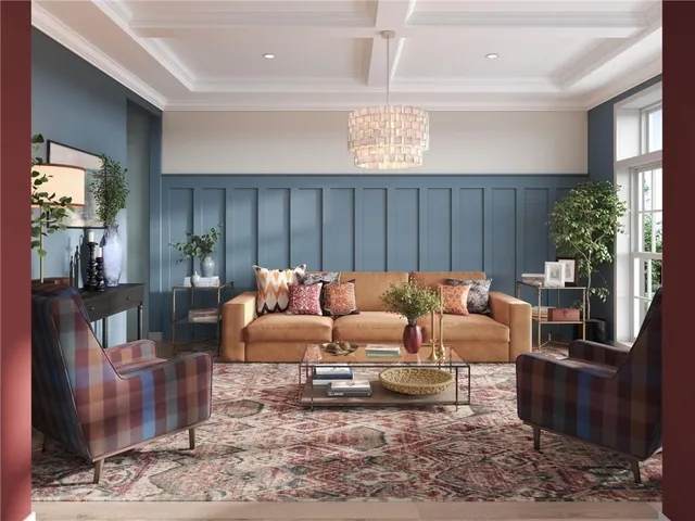 a living room with furniture wooden floor and a chandelier