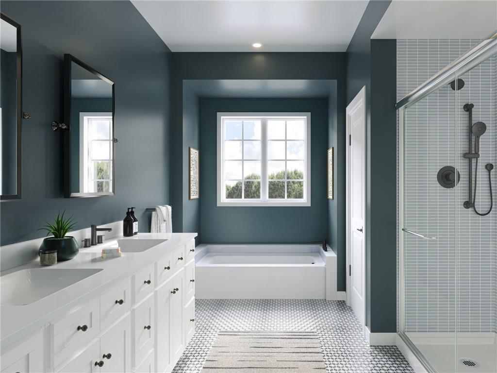 102 Ramsgate Road, Unit ORKNEY Cranberry Township, PA 16066 - Photo 21 of 40 a bathroom with a tub a sink and a window
