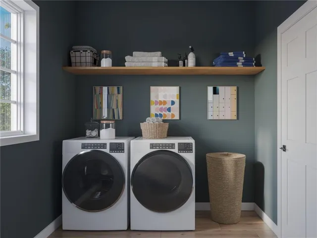 a utility room with dryer and washer