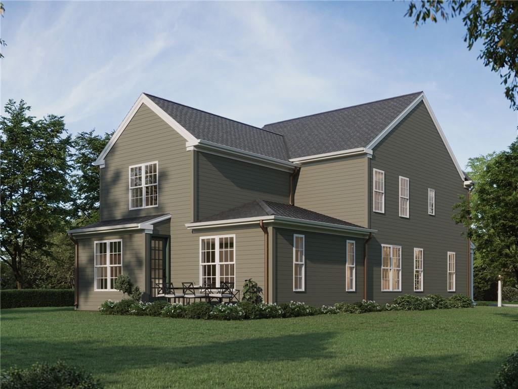 102 Ramsgate Road, Unit ORKNEY Cranberry Township, PA 16066 - Photo 29 of 40 a front view of a house with a yard and trees