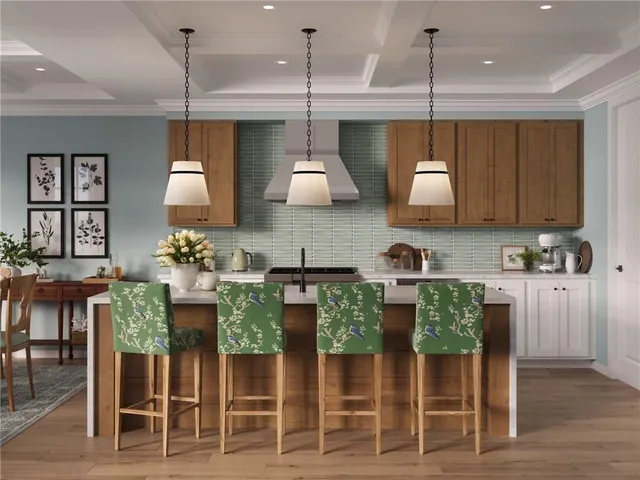 a kitchen with stainless steel appliances kitchen island granite countertop a table and chairs