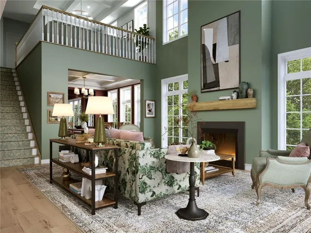 a living room with furniture a fireplace and a table