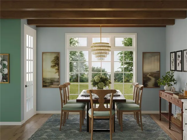 a view of a dining room with furniture window and outside view