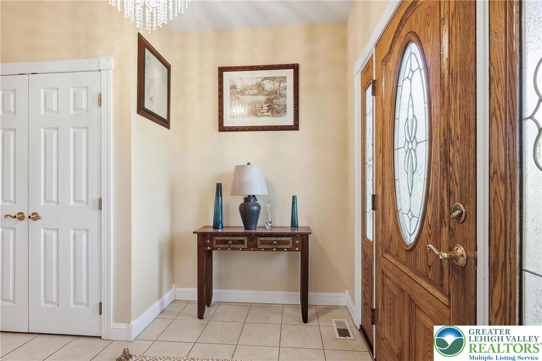 5217 Cider Press Road Schnecksville, PA 18078 - Photo 6 of 54 a view of living room and front door