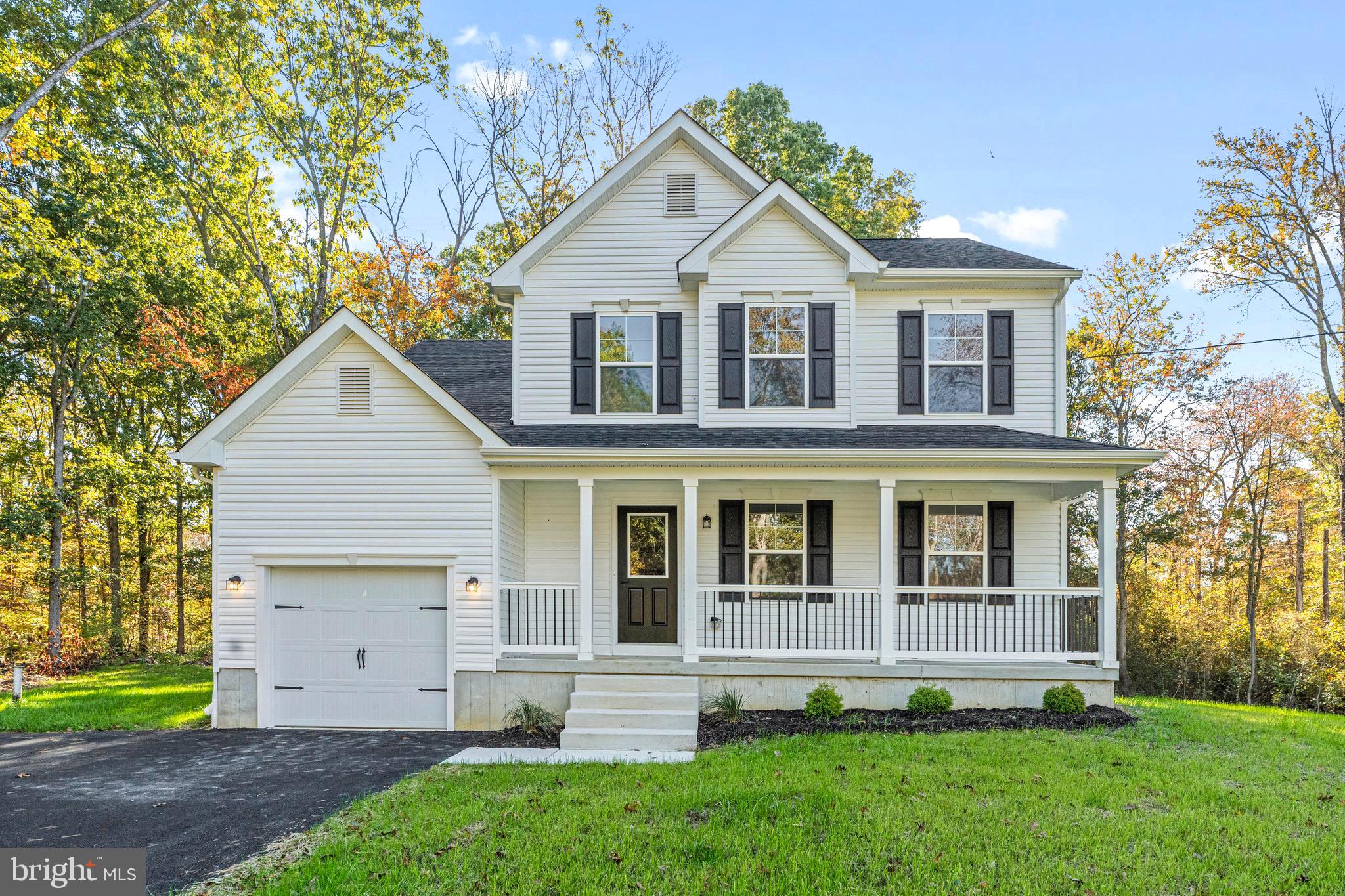 765 Little Mill Road Monroeville, NJ 08343 - Photo 1 of 39 a front view of a house with a yard and trees