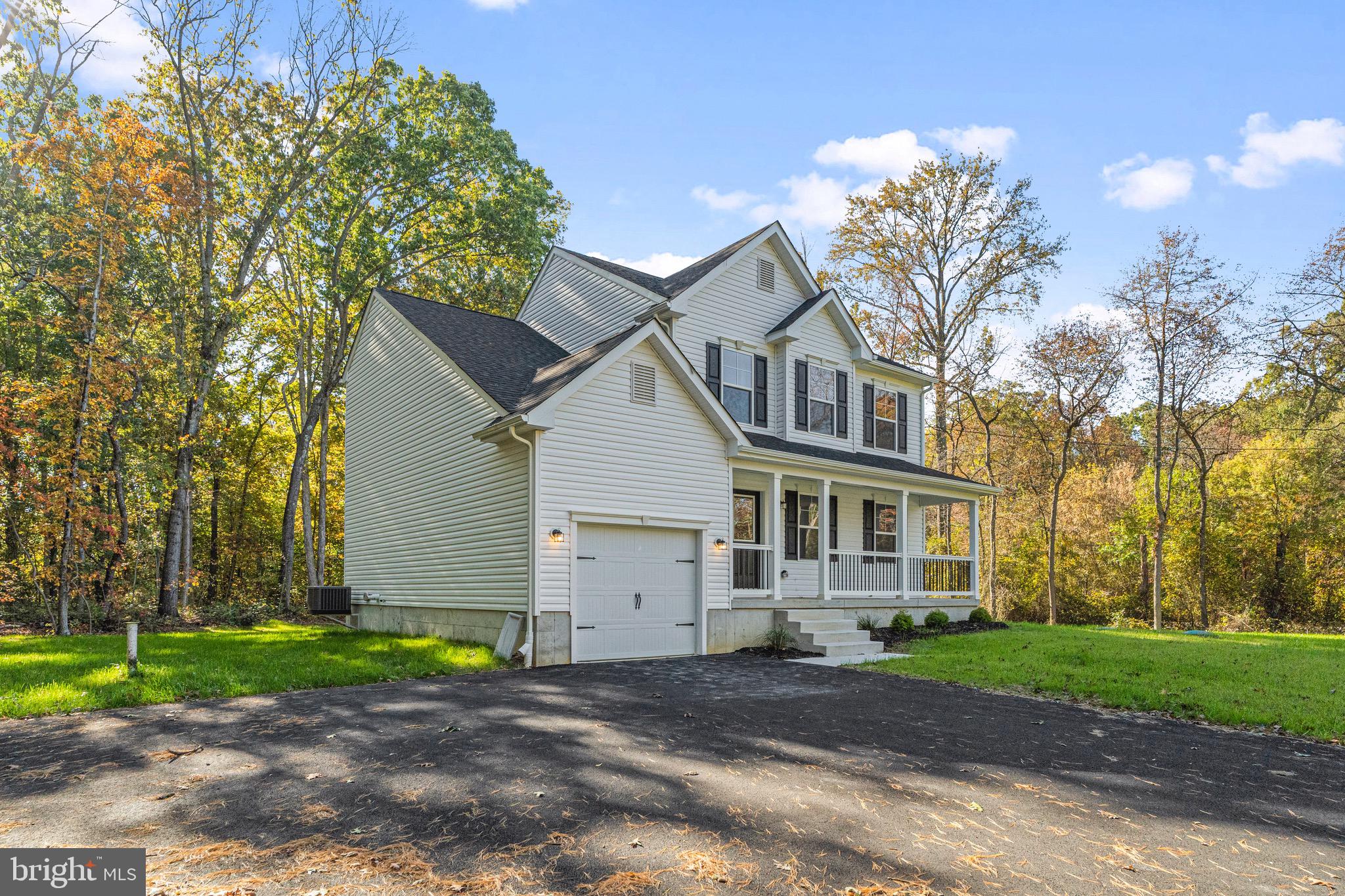 765 Little Mill Road Monroeville, NJ 08343 - Photo 2 of 39 a view of a house with a yard and large tree