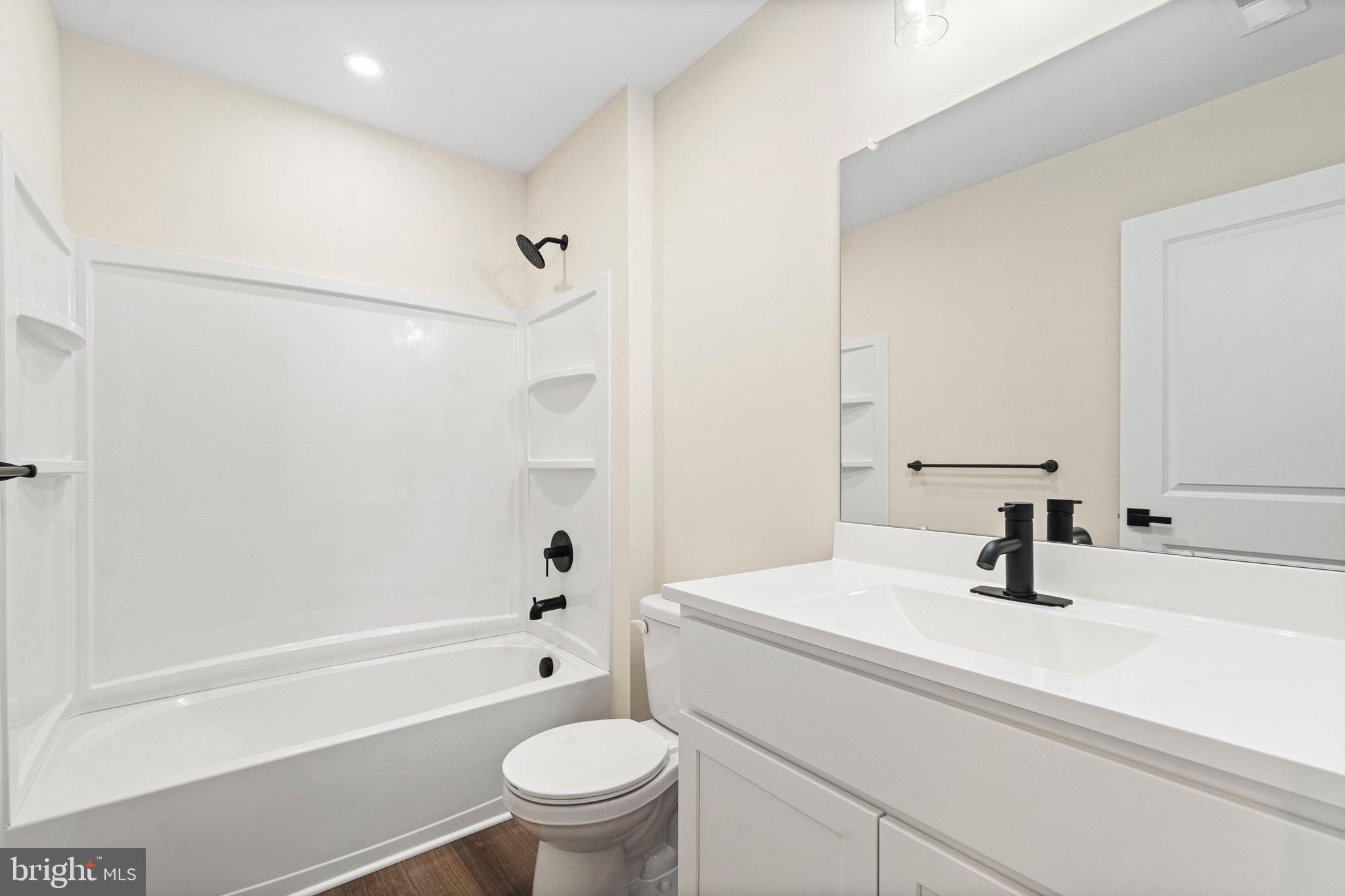 765 Little Mill Road Monroeville, NJ 08343 - Photo 25 of 39 a bathroom with a sink a toilet and a bathtub