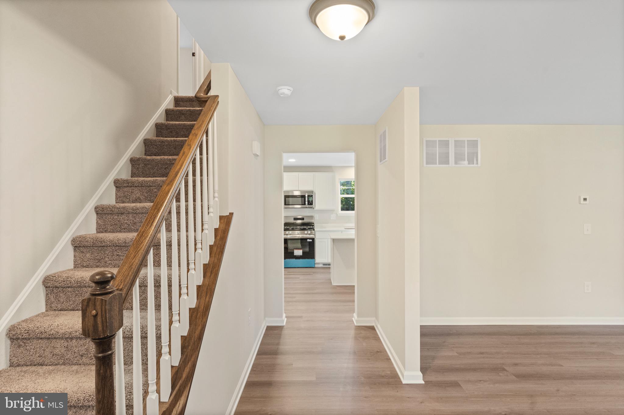 765 Little Mill Road Monroeville, NJ 08343 - Photo 7 of 39 a view of a hallway with wooden floor and entryway