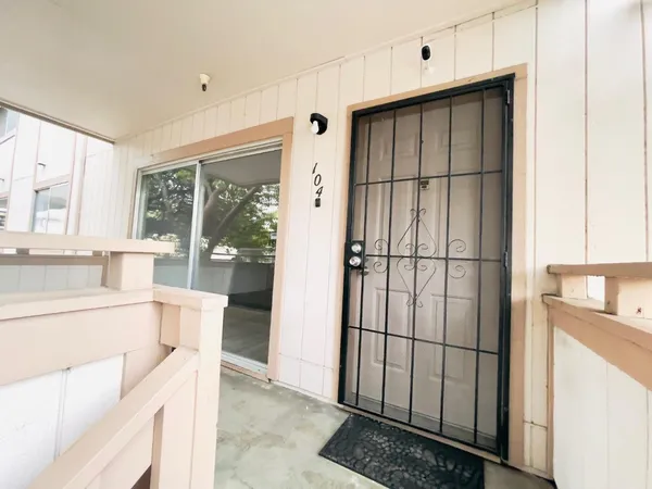 a kitchen with a sink and a large window
