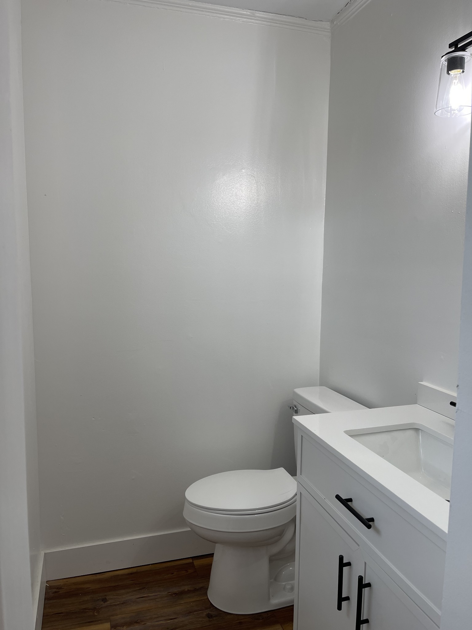 255 Maple Street Savannah, TN 38372 - Photo 13 of 20 a bathroom with a toilet and a sink